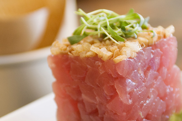 Tuna Tartare hand chopped “Ahi” tuna, avocado, soy lime dressing, served with potato gaufrettes